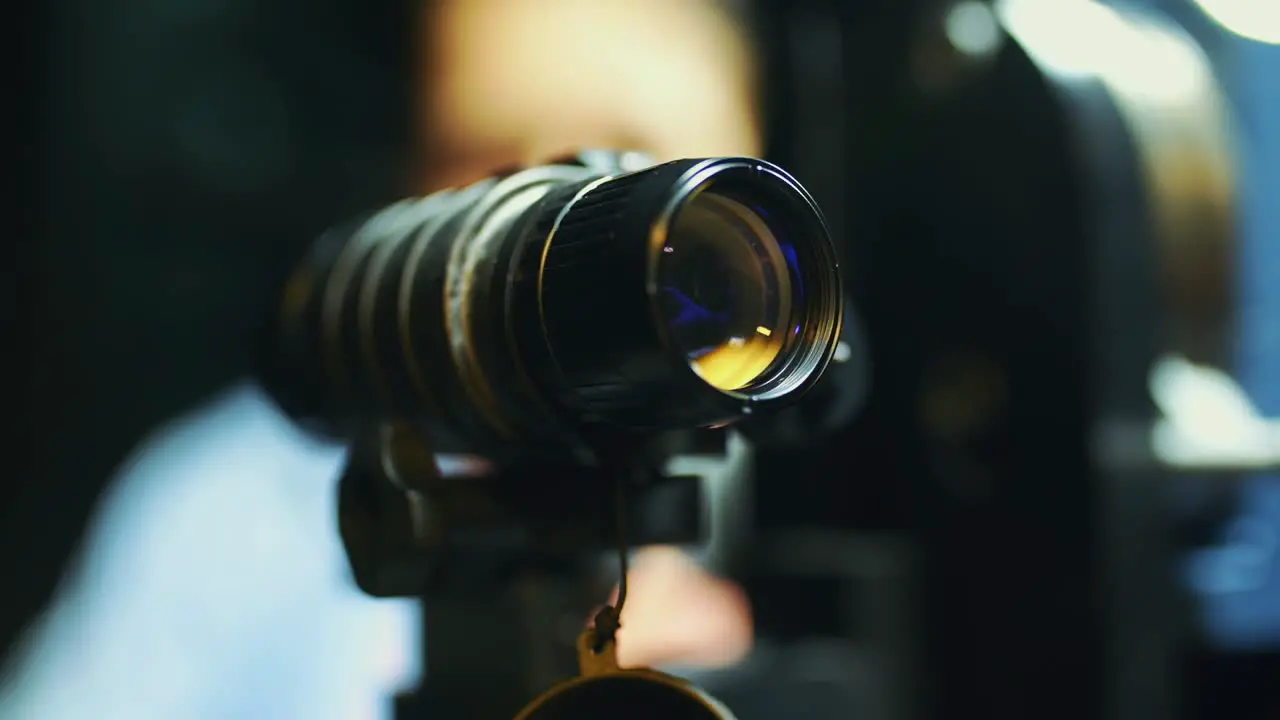 man working on the gun sight in the laboratory