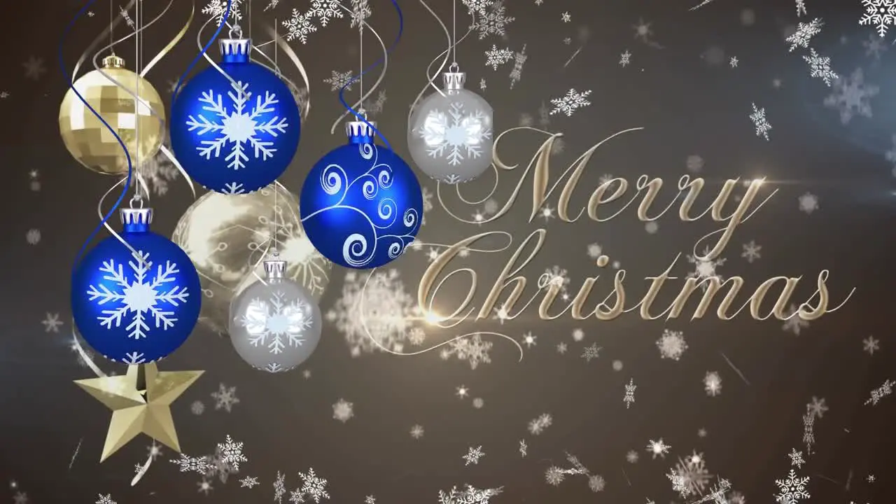 Animation of baubles and falling snowflakes and snow over merry christmas text with lens flare