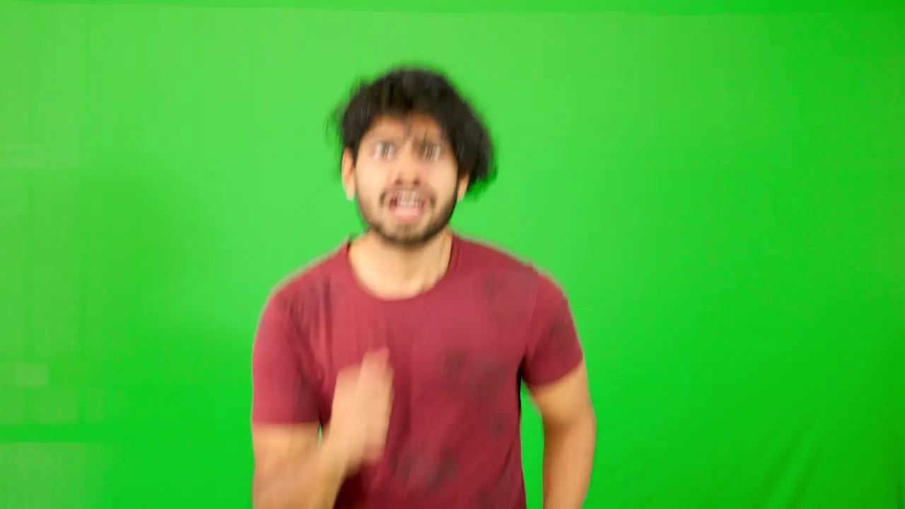 Indian guy running with green screen 
zombie following