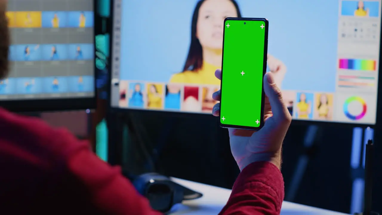 Photo editor following guide on green screen smartphone about using retouching software