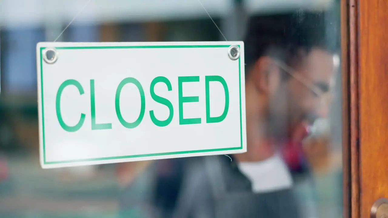 Door closed sign smile and restaurant man