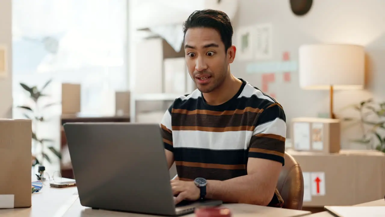 Happy asian man laptop and fist pump in success