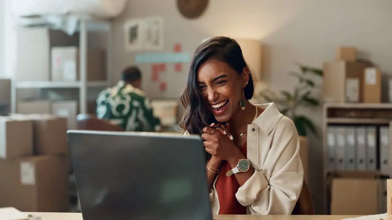 Happy woman laptop and fist pump in celebration