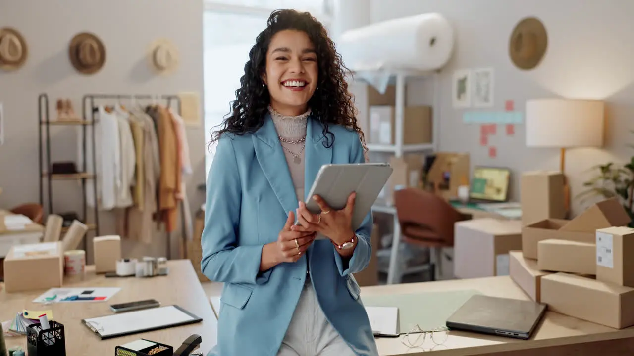 Designer woman tablet and smile at workshop