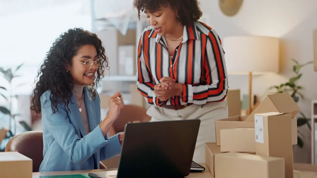 Designer women high five and laptop at fashion