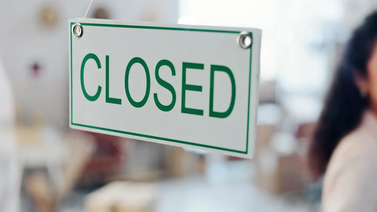 Woman closed sign and happy at boutique door