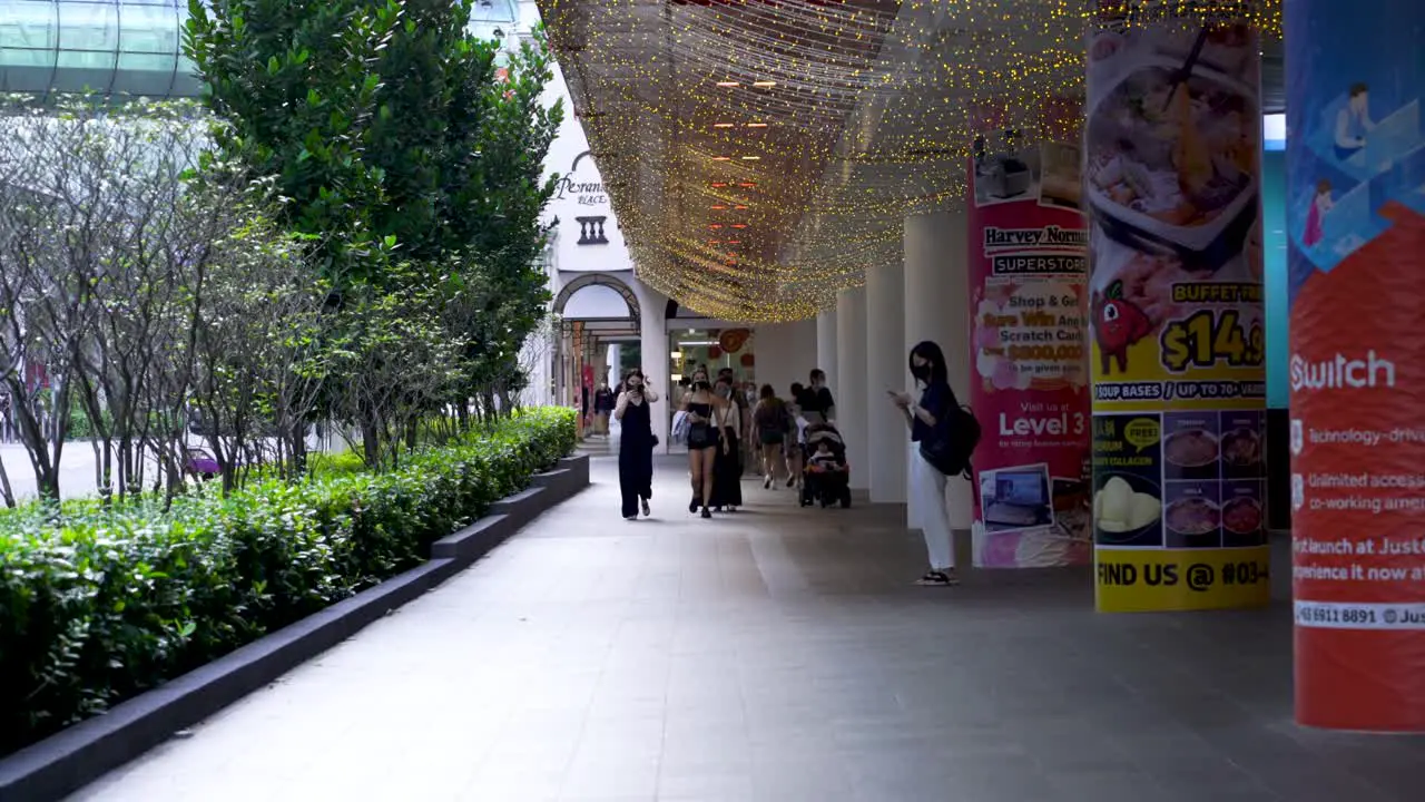 People walking along Orchard Road