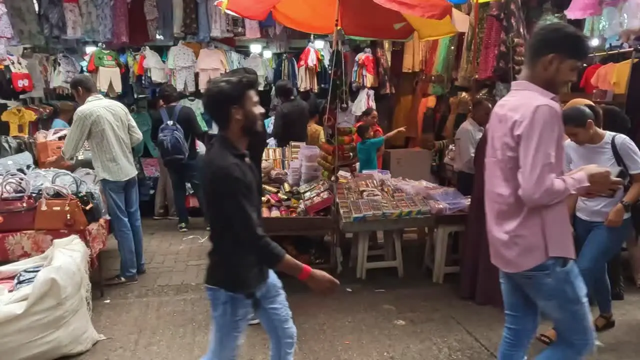 Mumbai India 20 August 2023 People walking through a market in Mumbai India and perusing the stalls