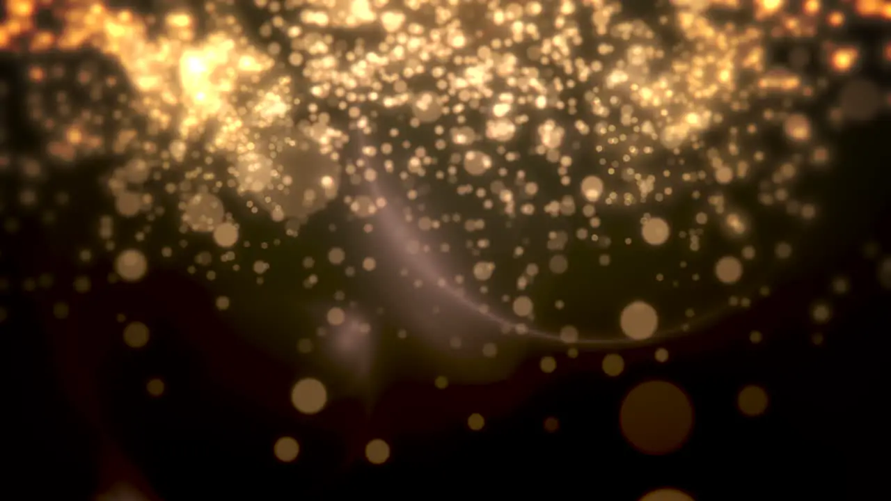 Yellow bokeh and particles falling Happy New Year and Merry Christmas