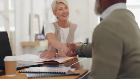 Elderly business people handshake