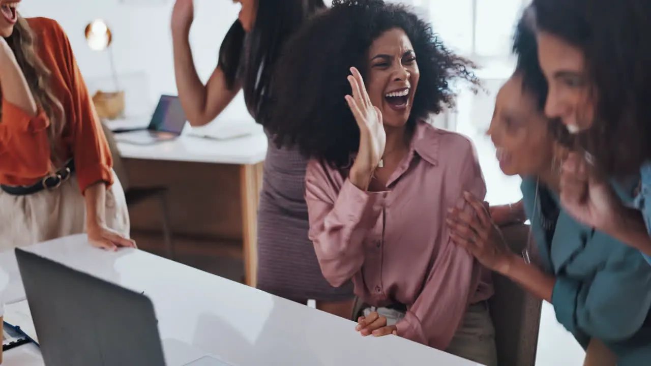 Teamwork laptop and high five celebration