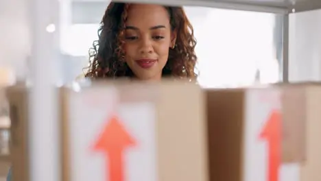 Woman logistics and shipping boxes on storage