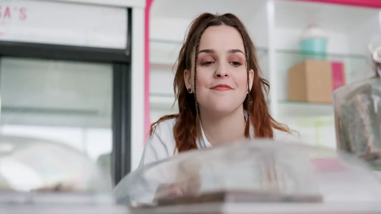 Retail cake and bakery with woman in store