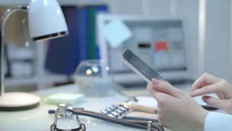 Medical hands holding tablet at workplace Doctor using tablet computer