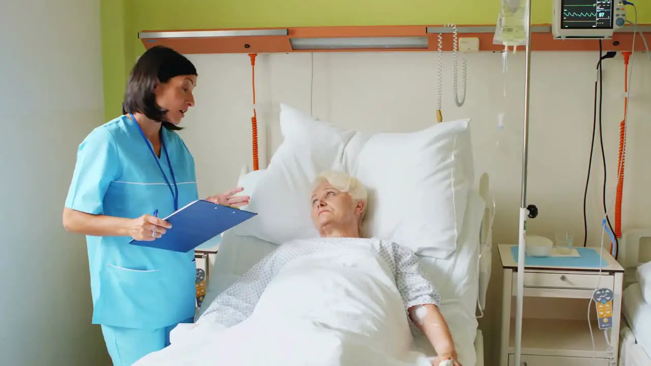 Female nurse interacting with patient