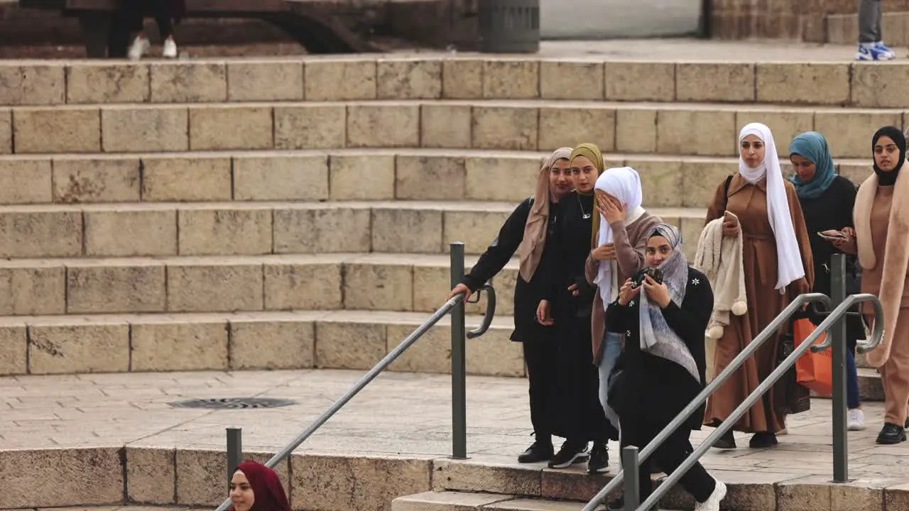 Muslim women walking in middle eastern city