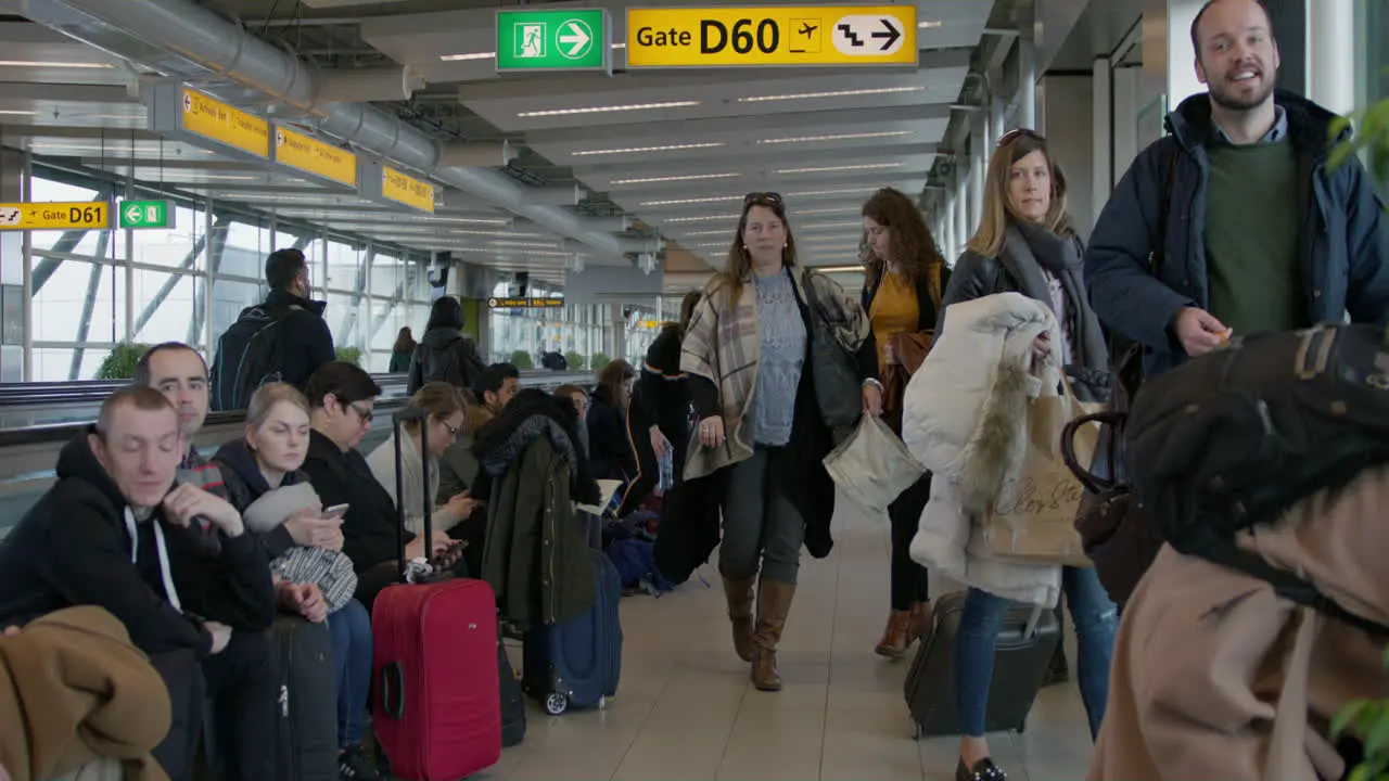 Amsterdam Airport People Walking Through The Airport 4K Slow Motion RED Camera