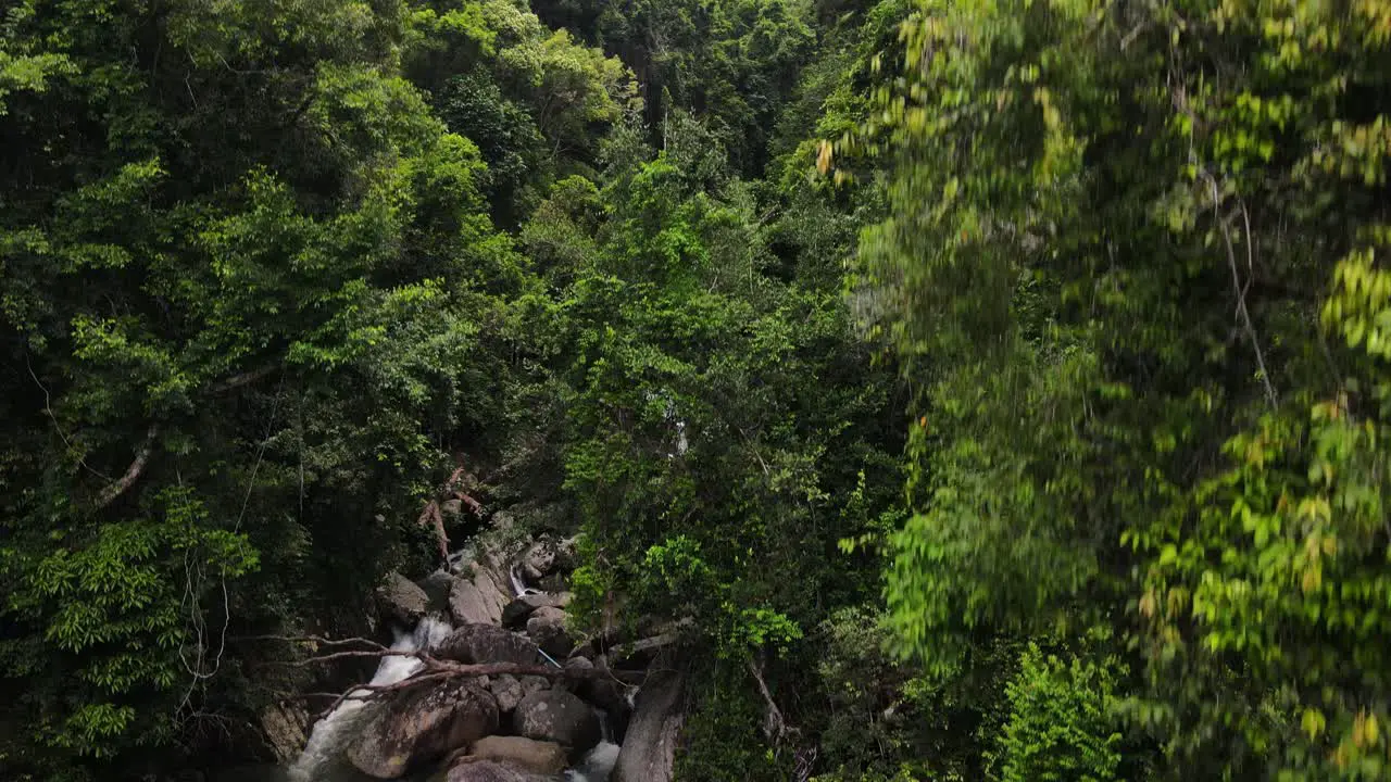 A tilt up shot of Sadet waterfall on Koh Phangan Surat Thani Thailand