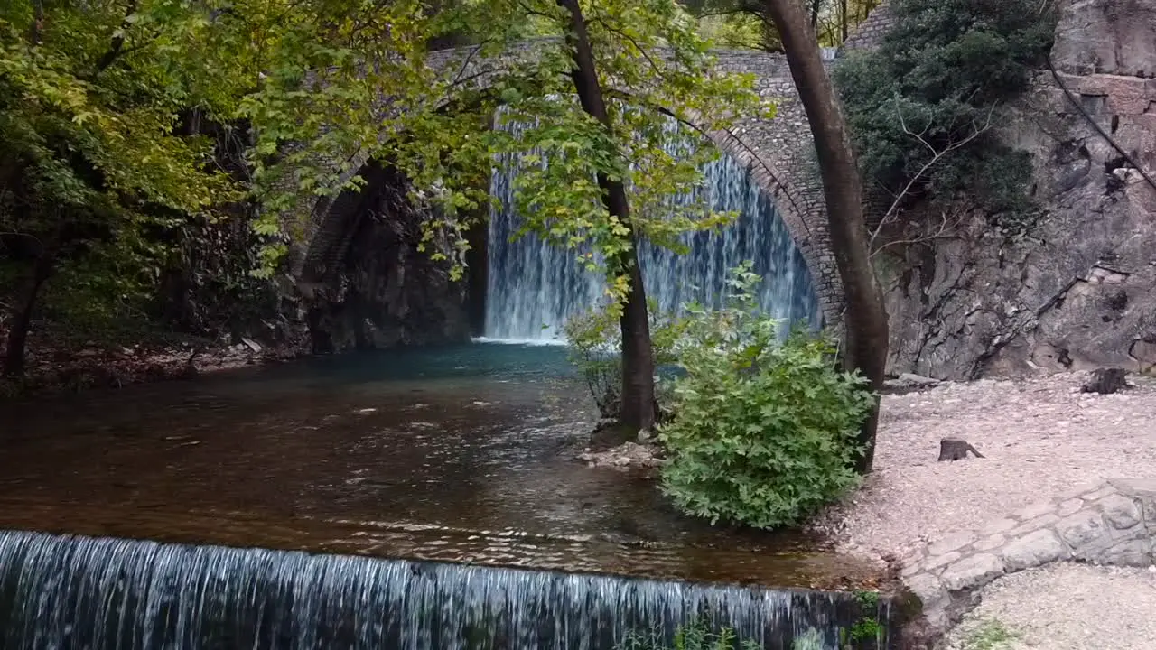 Over an old stoned bridge of Palaiokarias Thessaly in Greece