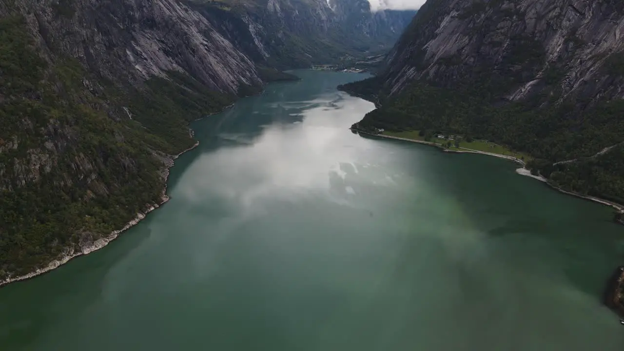 Areal footage of the beautiful Eidfjord fjord with green water in Western Norway