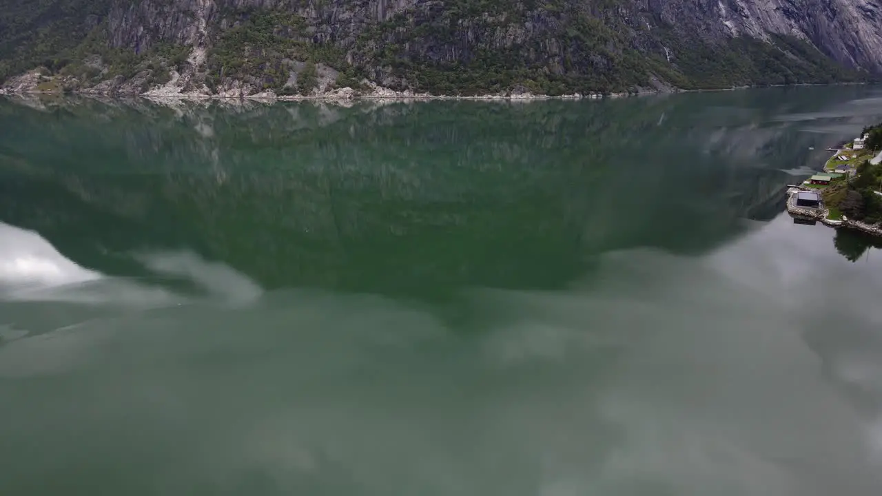 Green water and currents in Eidfjord beautiful fjord in Western Norway