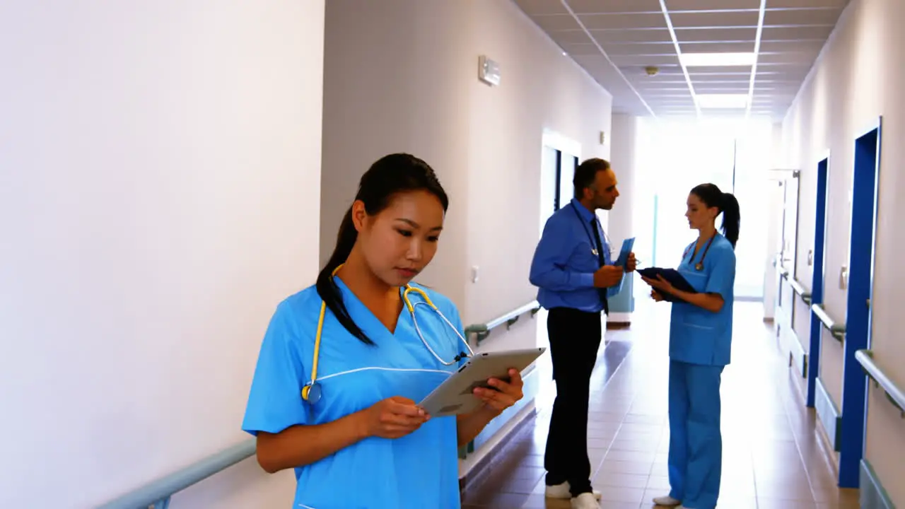 Nurse holding digital tablet in hospital