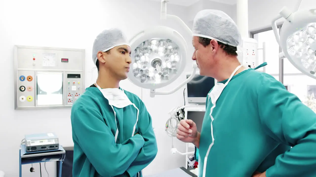 Male surgeons interacting with each other in operation room