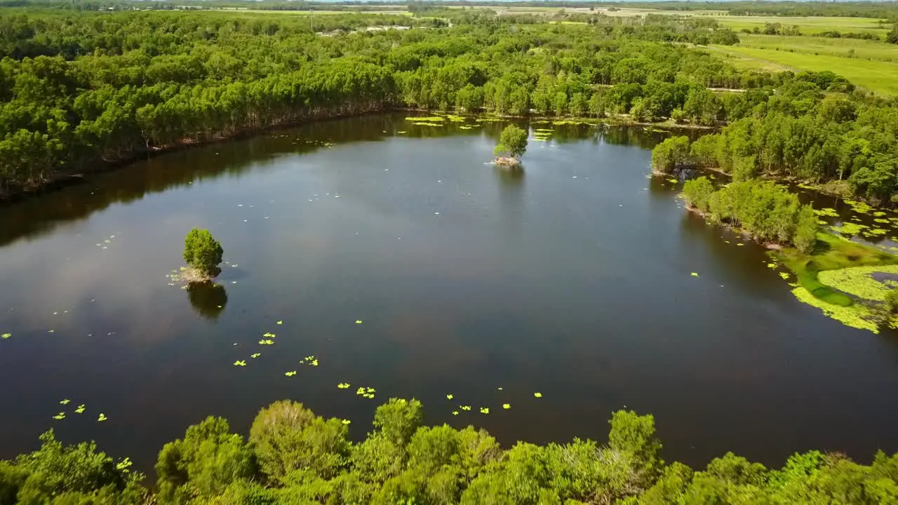 Low and then rising aerial footage of the Cattana Wetlands at Smithfield near Cairns Queensland Australia