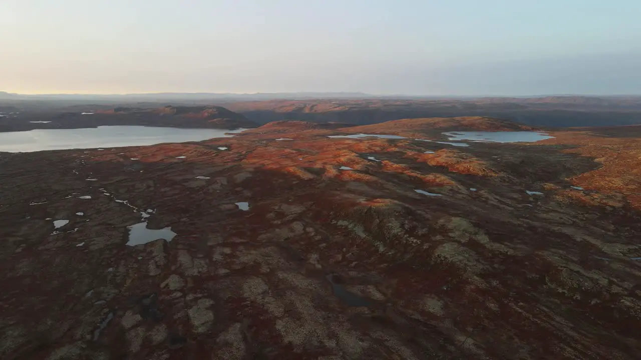 Mars looking landscape with mountains and lakes at sunset in Southern Norway