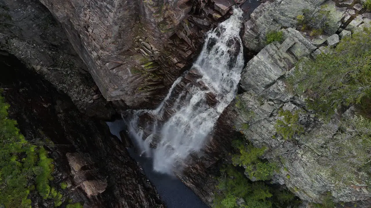 Zooming in drone footage of Juvfossen waterfall in Southern Norway