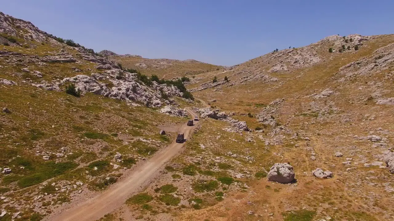 Off road cars driving on mountain and rocks