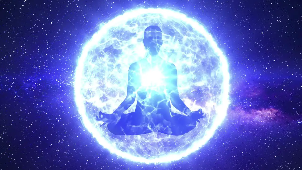 Silhouette of man doing yoga meditation enveloped in a sphere of energy or aura light with the heart chakra illuminated