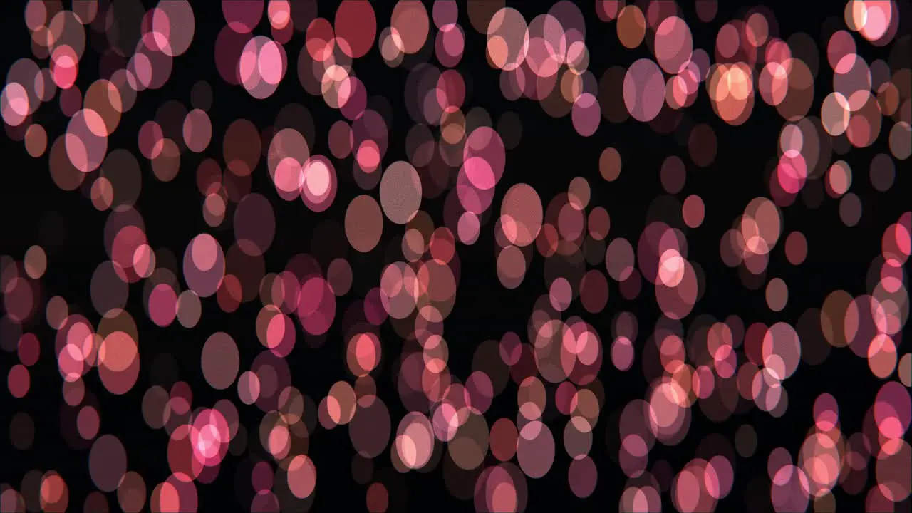 Animation of bokeh with increased height of rose colored circles