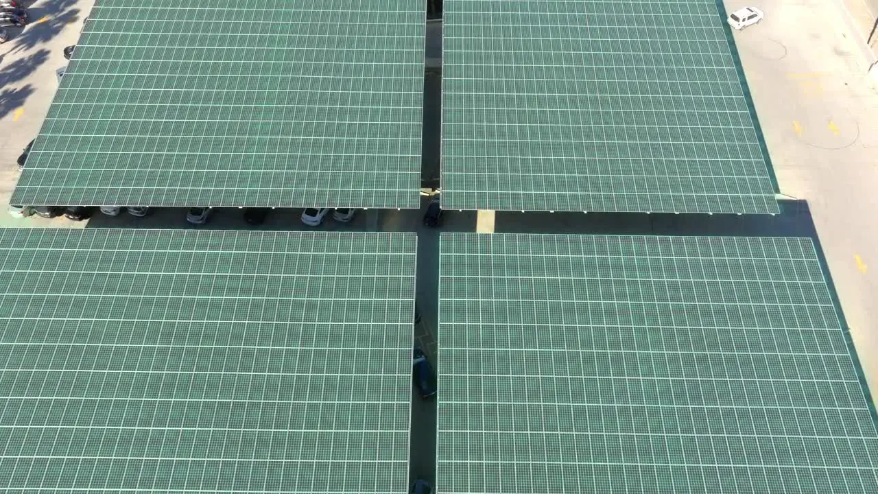 Sunlight activating carport solar panels at a parking lot Aerial 3D overlay