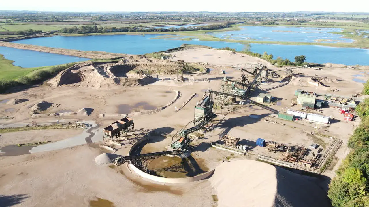 Tarmac Quarry Collingham Newark on Trent aerial view pull back reveal lakes in background