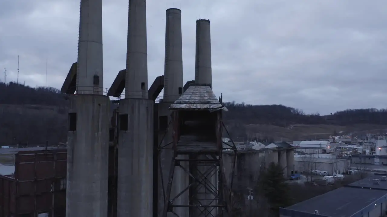 Drone shot flying towards an abandoned factory