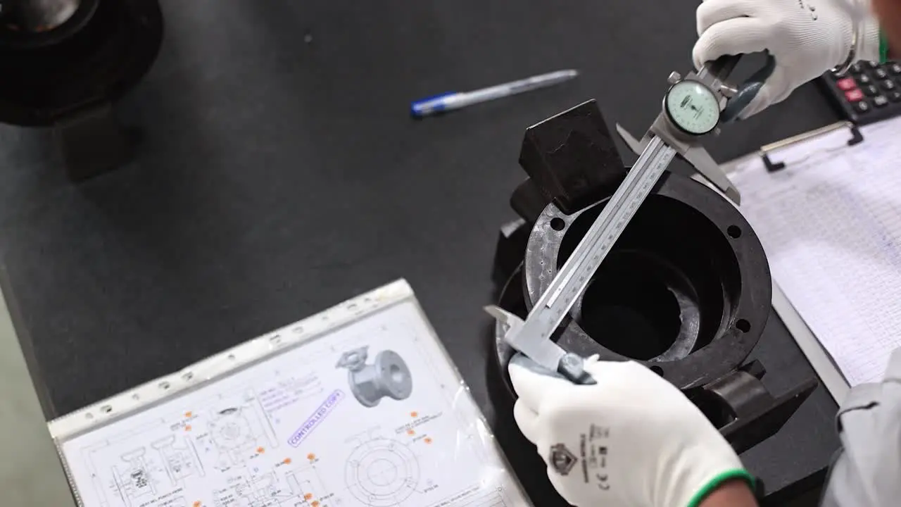 Top view of finished wax mold being measured as per design and quality checked as per graph on table