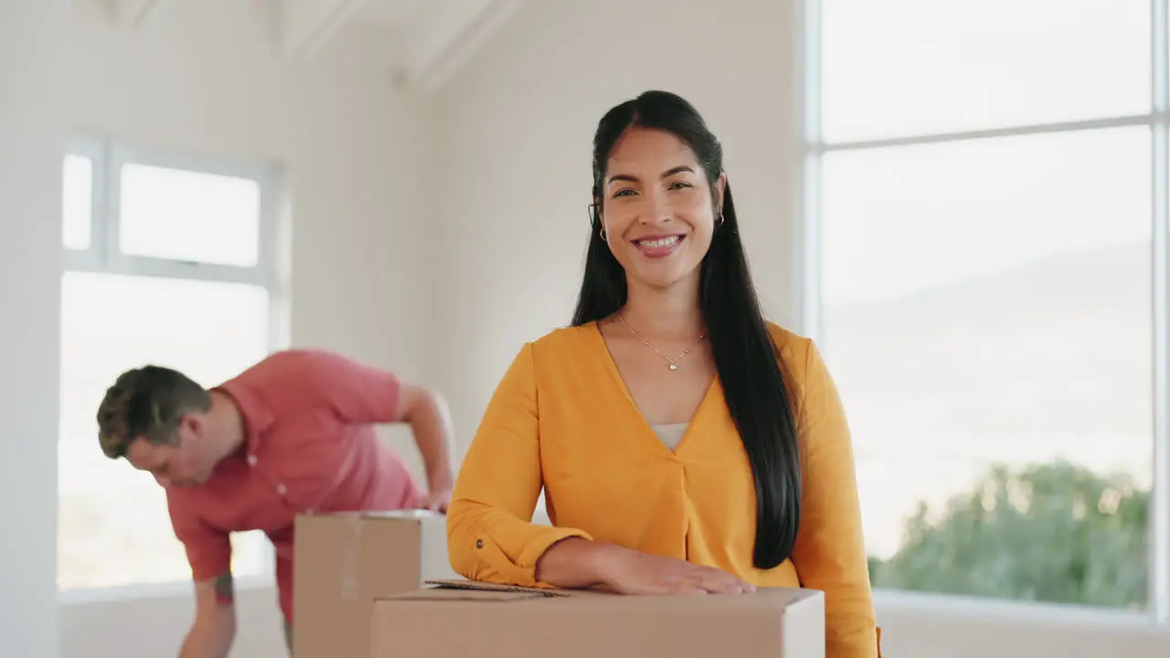 Cardboard boxes and woman moving into her new