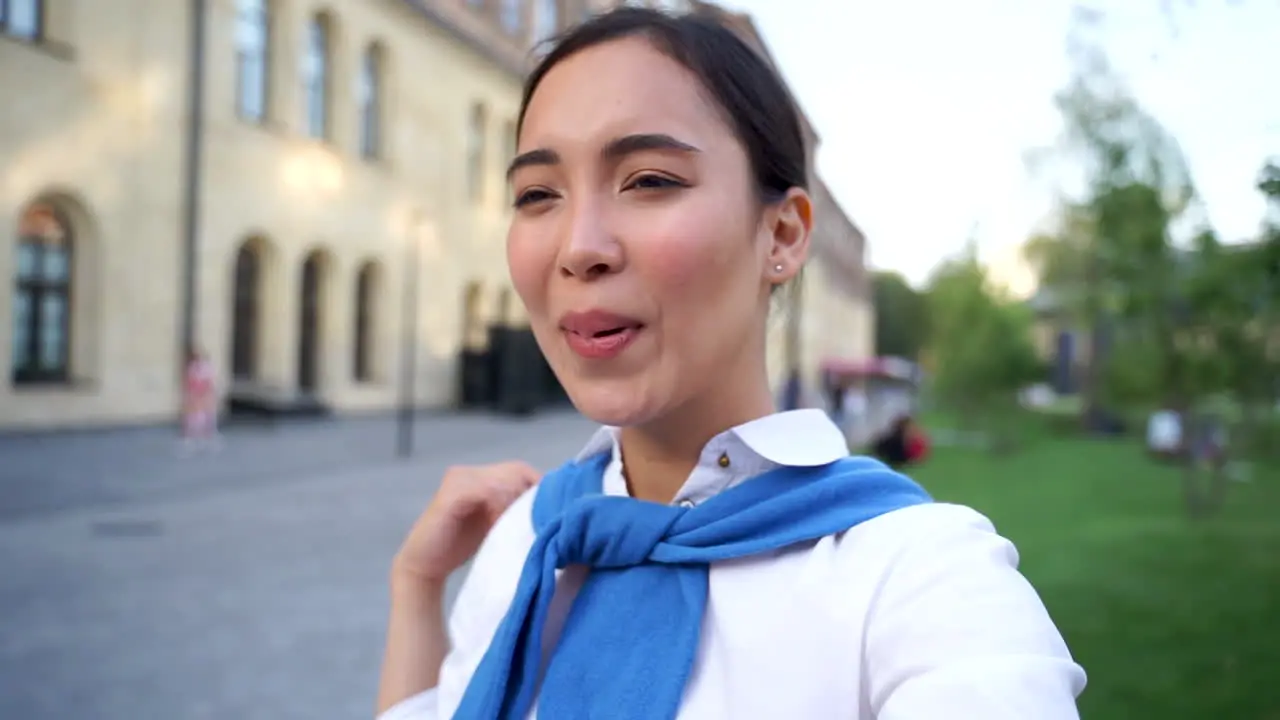 Cheerful Woman Talking To Camera Having A Video Call Outdoors