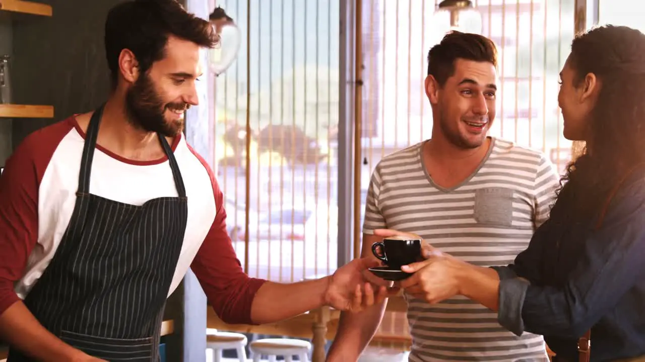 Couple customer waiting for coffee at counter