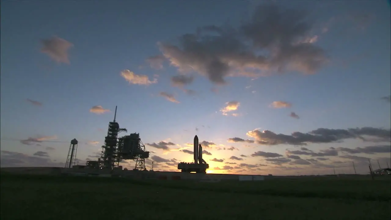 Space Shuttle on Crawler Transporter at Sunrise