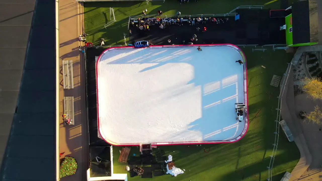 Aerial overhead shot of zamboni clearing ice rink in downtown Clarksville Tennessee