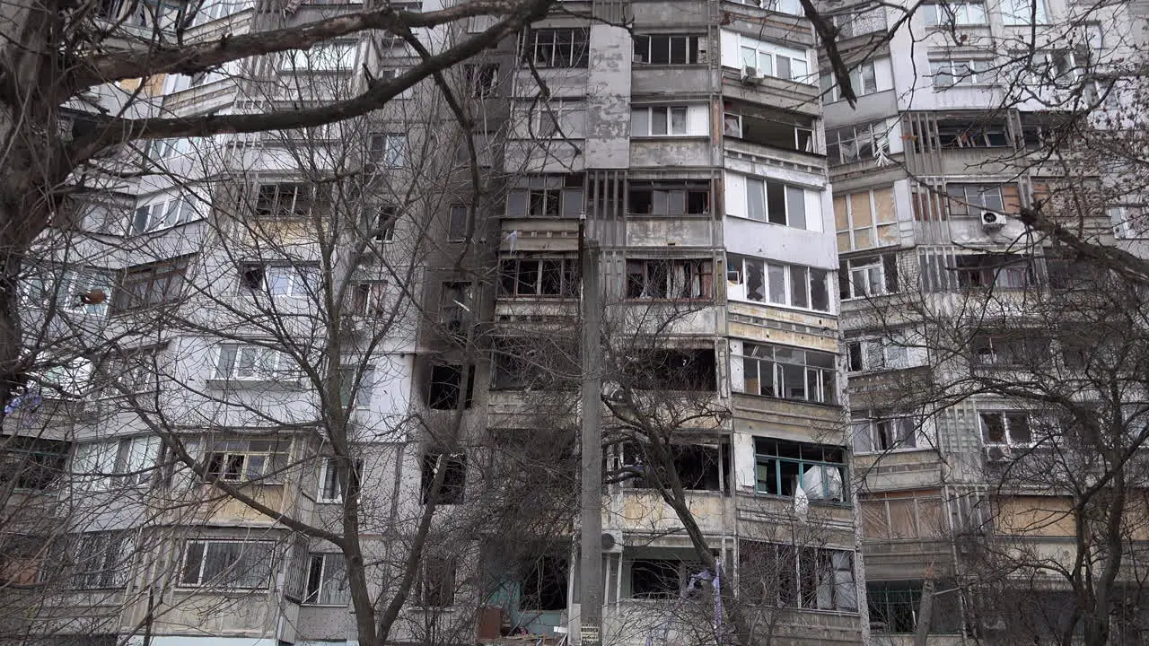 A residential building on the east riverfront of the Dnipro river lies badly damaged from shelling following the retreat by Russian forces during the war in Ukraine