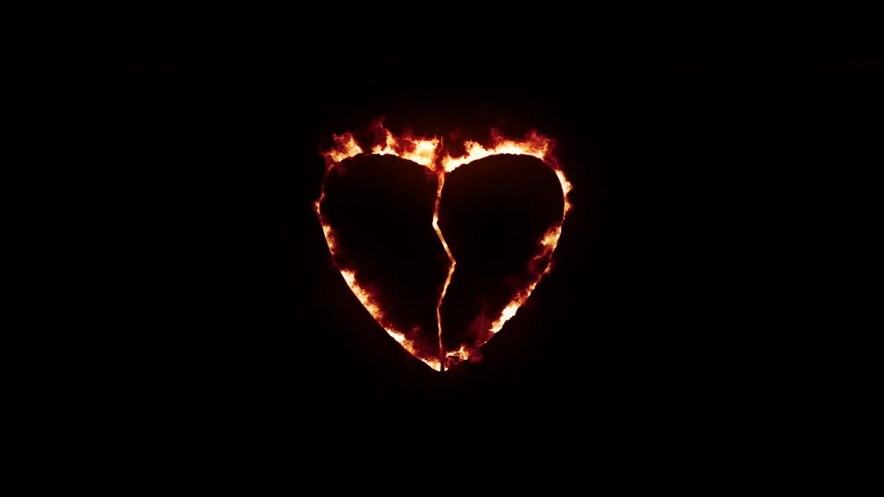 Broken heart with fire and burning effect on black background