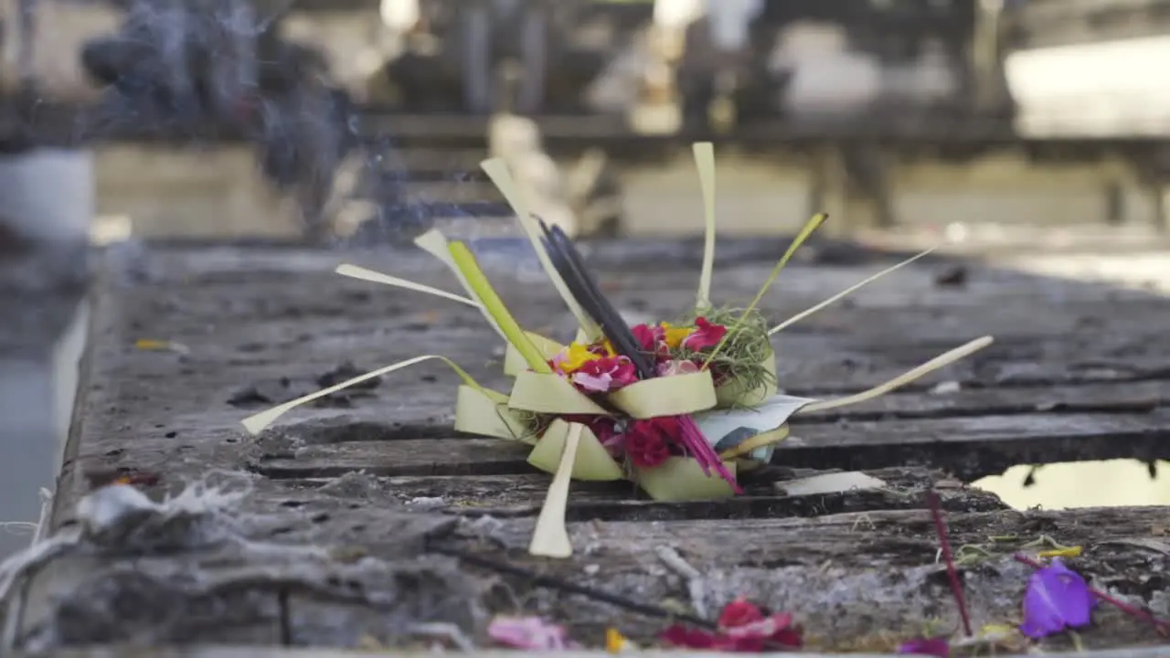 Smoke rising from a sacred incense at Pura Luhur Lempuyang temple