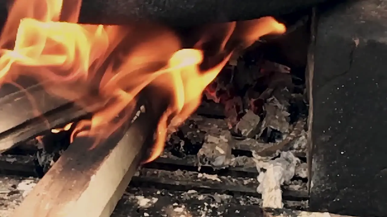 Slowmotion View of Indian traditional style hand made a fireplace to cook the food with wood coal etc