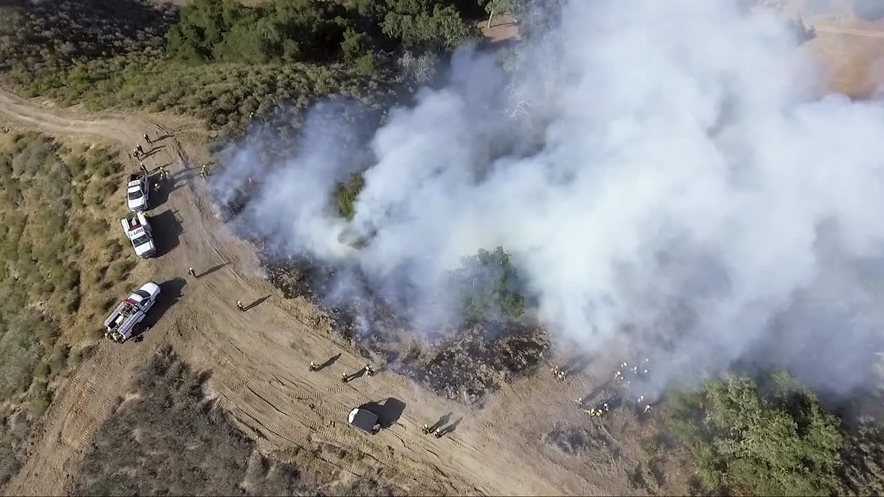 AERIAL Trainee firefighters control the fire