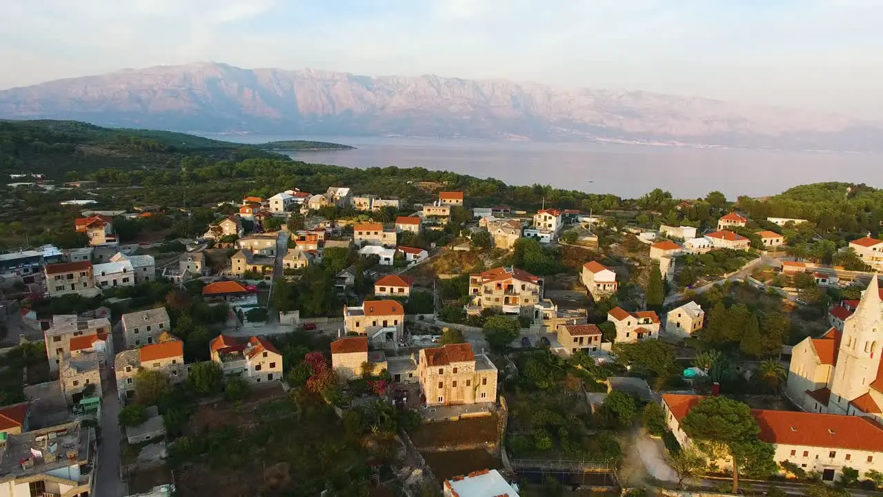 Moving aerial drone shot of the town Selca Island Brac Croatia Europe