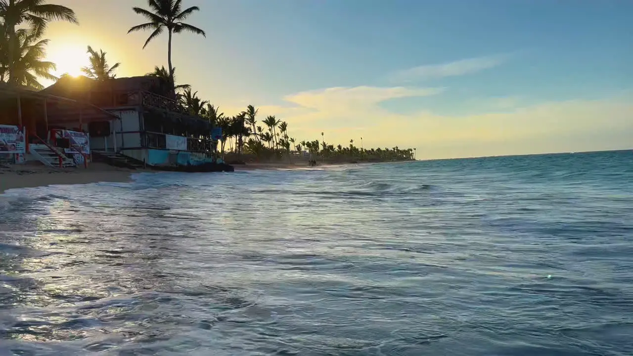 waves rolling in at high tide at sunset on the island of Hispaniola Dominican Punta Cana