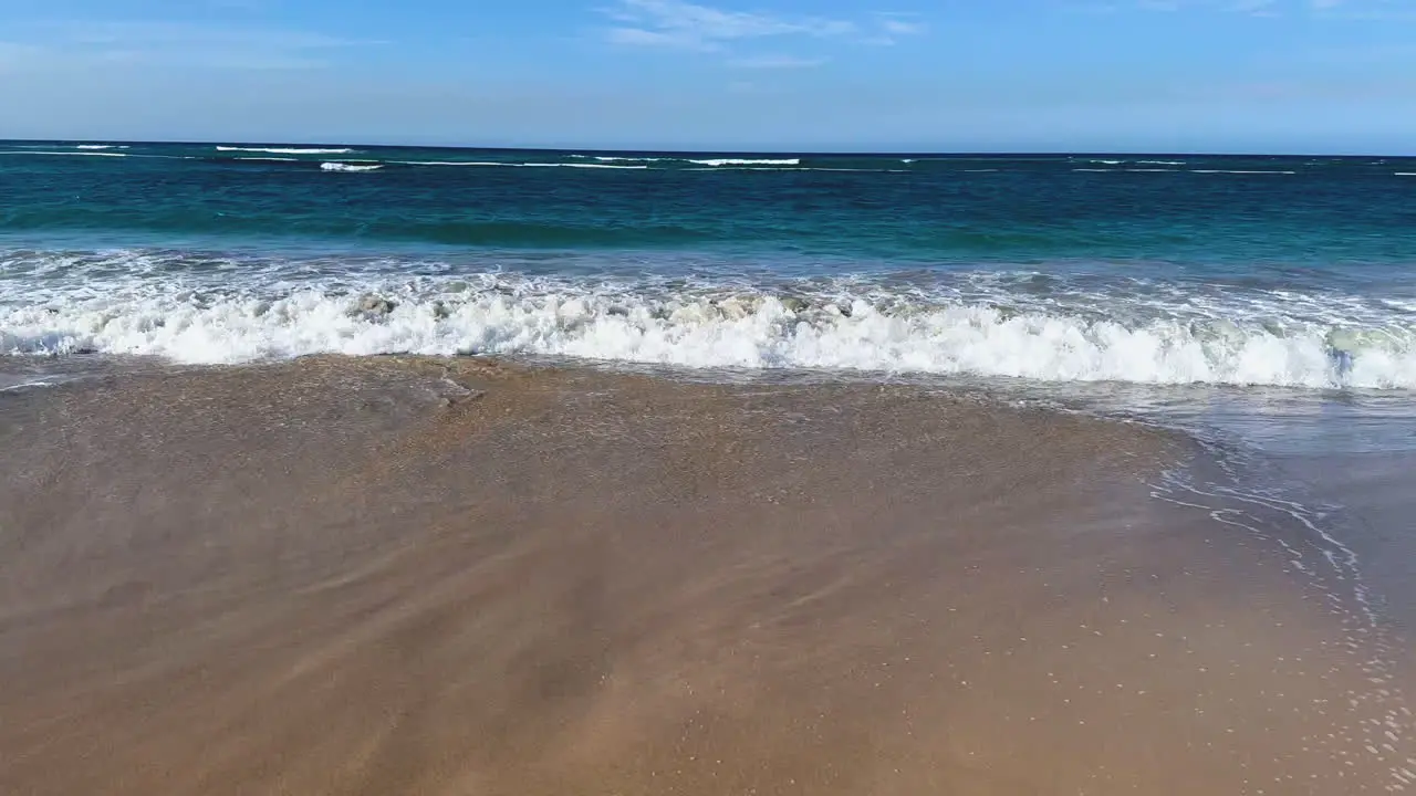 interesting wave patterns as the waves retreat from the beach